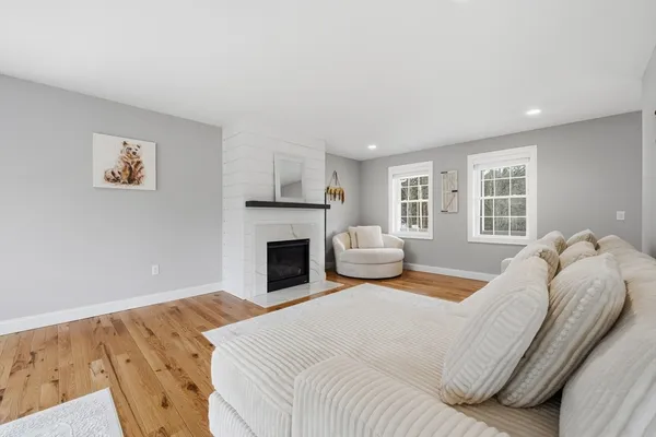 a living room with furniture and a table