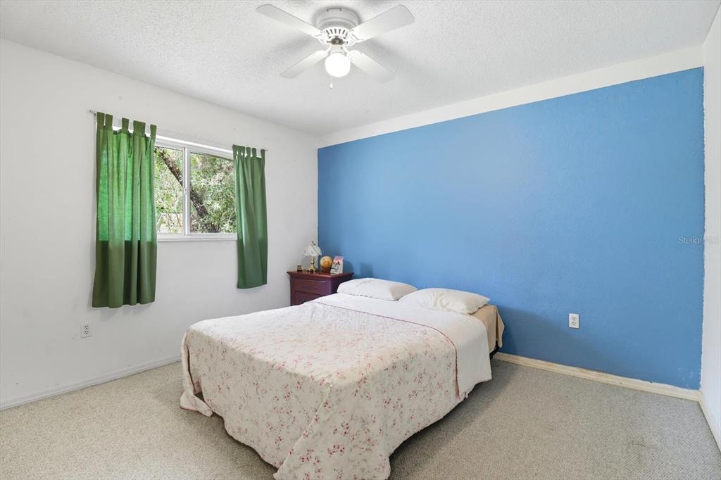 4355 West Justice Court Homosassa, FL 34446 - Photo 20 of 30 a bedroom with a bed and a window
