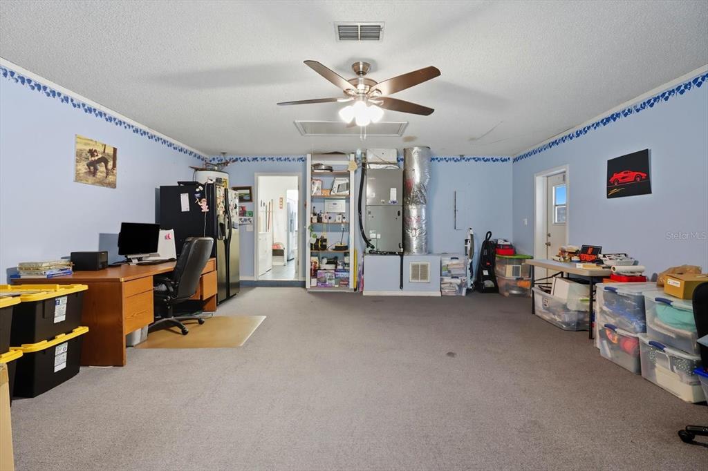 4355 West Justice Court Homosassa, FL 34446 - Photo 24 of 30 a view of a room with workspace and a window