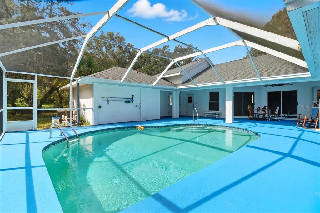 4355 West Justice Court Homosassa, FL 34446 - Photo 26 of 30 a view of a house with pool and a yard