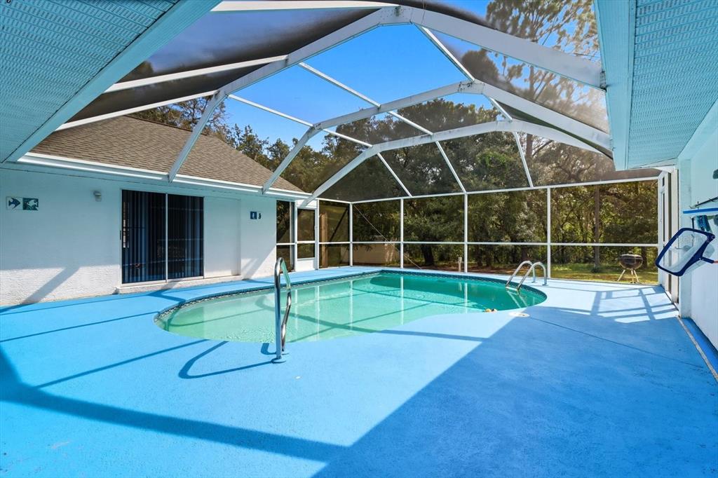 4355 West Justice Court Homosassa, FL 34446 - Photo 27 of 30 a view of a house with a backyard