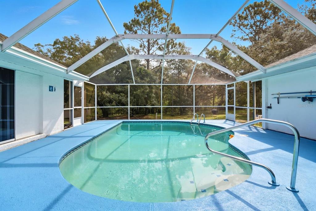 4355 West Justice Court Homosassa, FL 34446 - Photo 28 of 30 a view of a house with a swimming pool