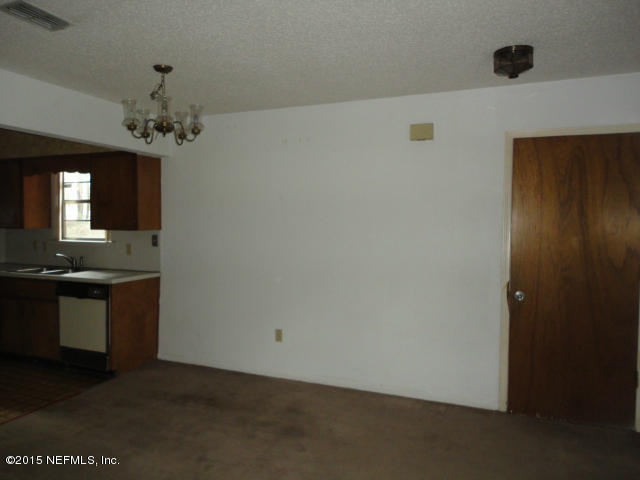 4624 Barnes Road South Jacksonville, FL 32207 - Photo 6 of 13 a view of a kitchen with a sink and dishwasher