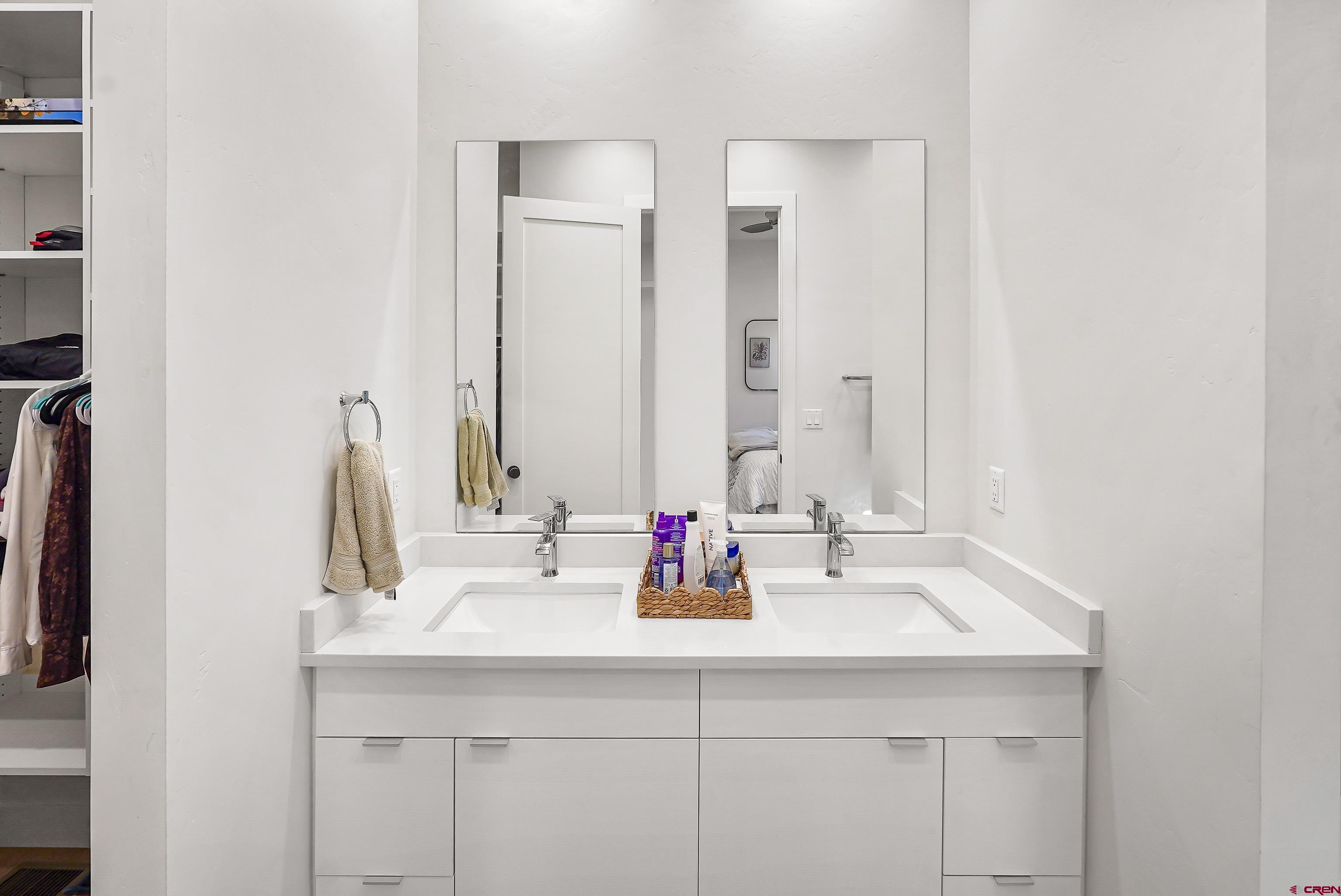 106 Elevation Drive Durango, CO 81303 - Photo 15 of 21 a bathroom with double vanity sink and a mirror