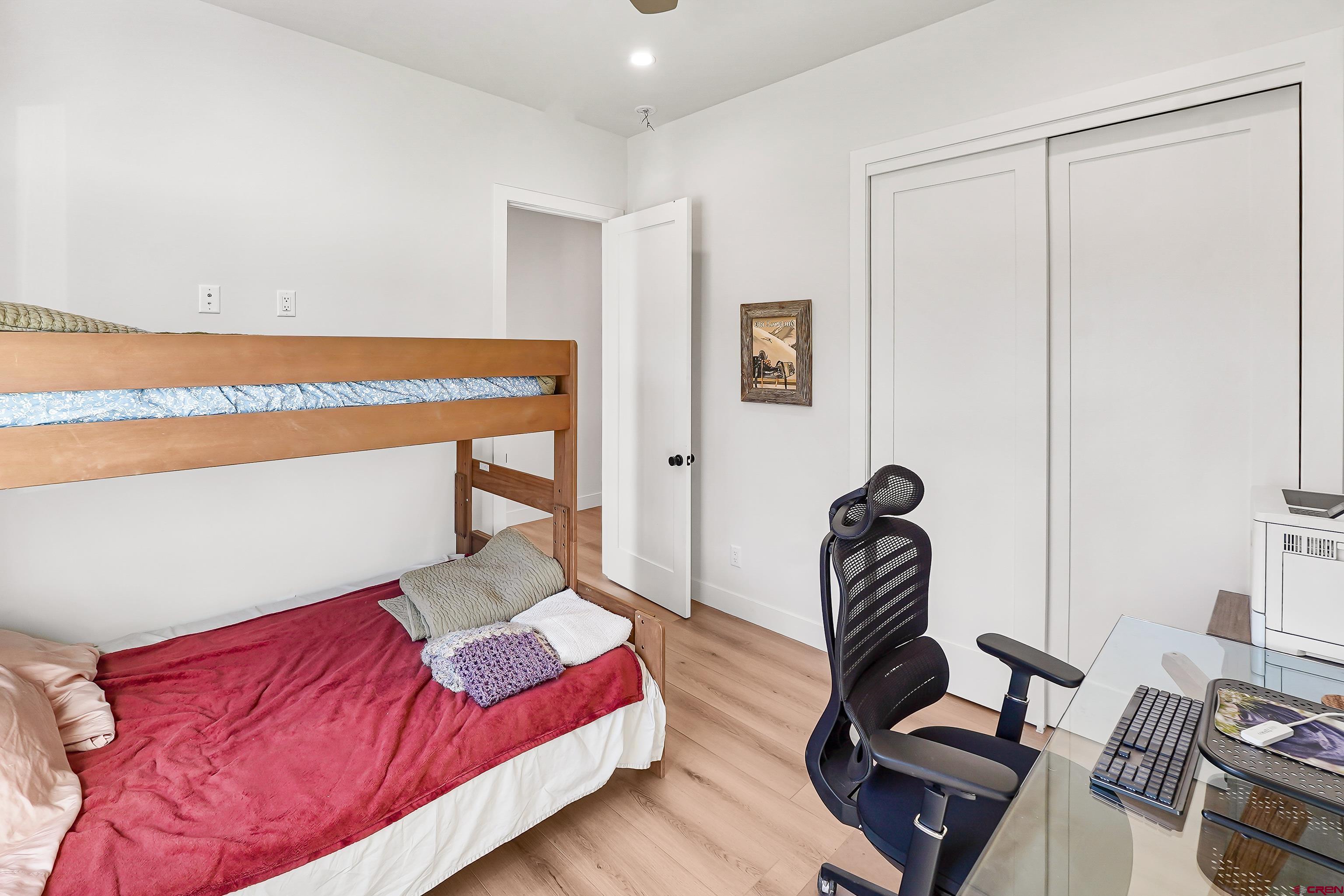 106 Elevation Drive Durango, CO 81303 - Photo 19 of 21 a living room with furniture and a wooden floor