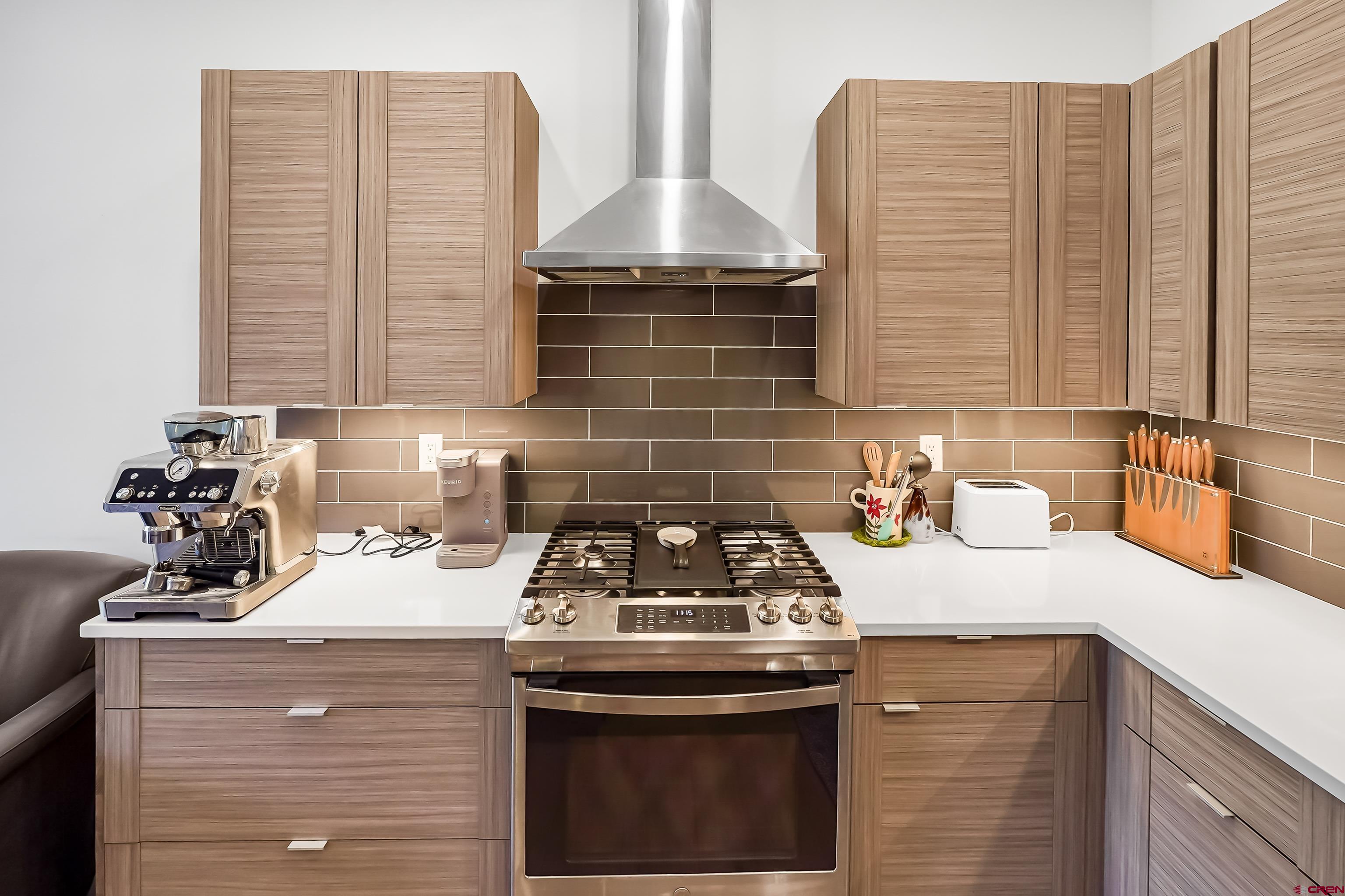 106 Elevation Drive Durango, CO 81303 - Photo 8 of 21 a kitchen with a stove and a sink