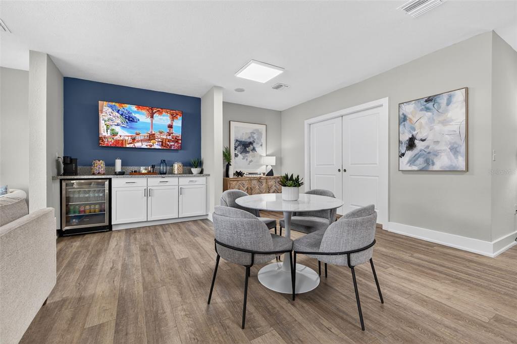 612 Bass Court, Unit 620B Dunedin, FL 34698 - Photo 18 of 32 a living room with furniture and a flat screen tv