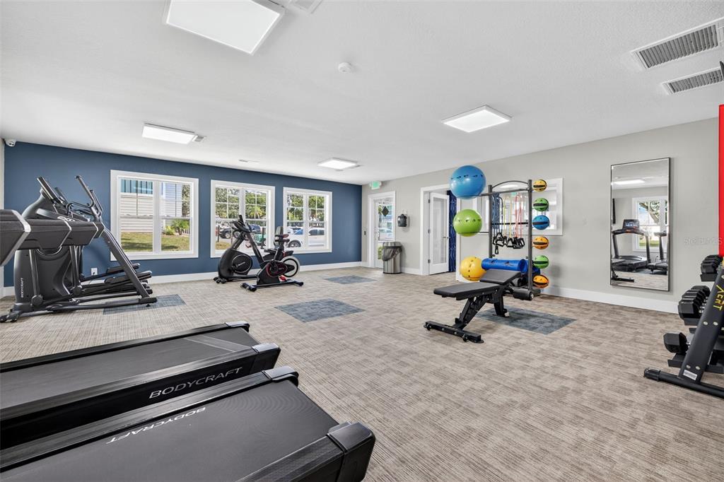 612 Bass Court, Unit 620B Dunedin, FL 34698 - Photo 27 of 32 a view of a room with gym equipment