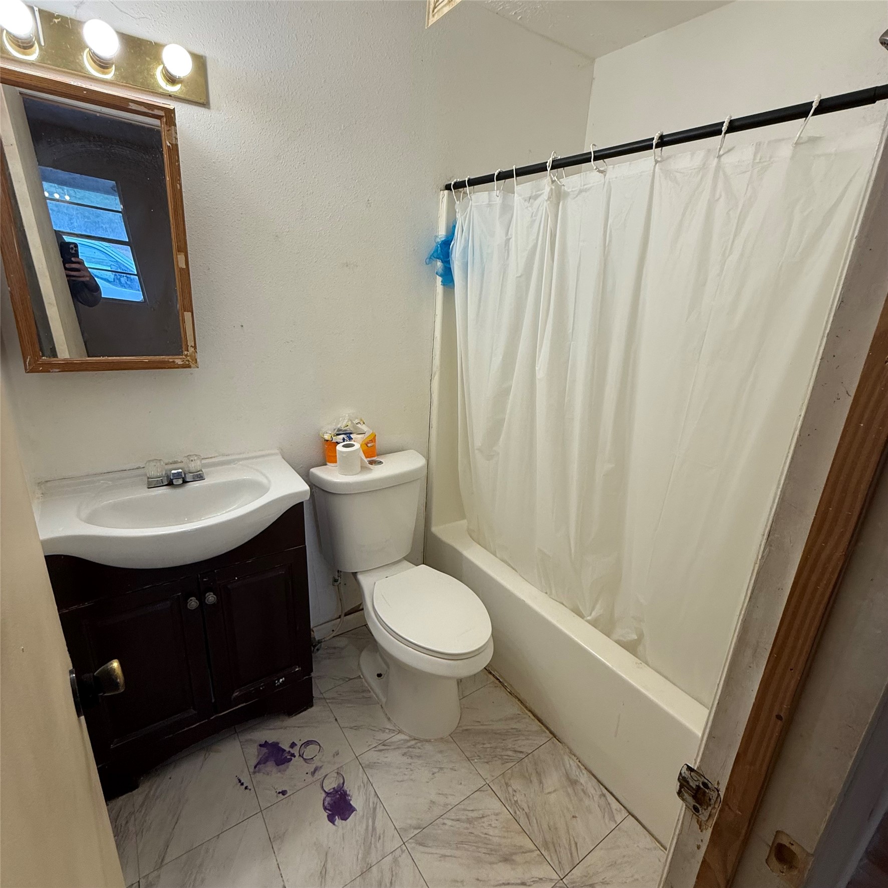 26113 Tyler Park Road Bedias, TX 77831 - Photo 11 of 24 a bathroom with a sink and a toilet