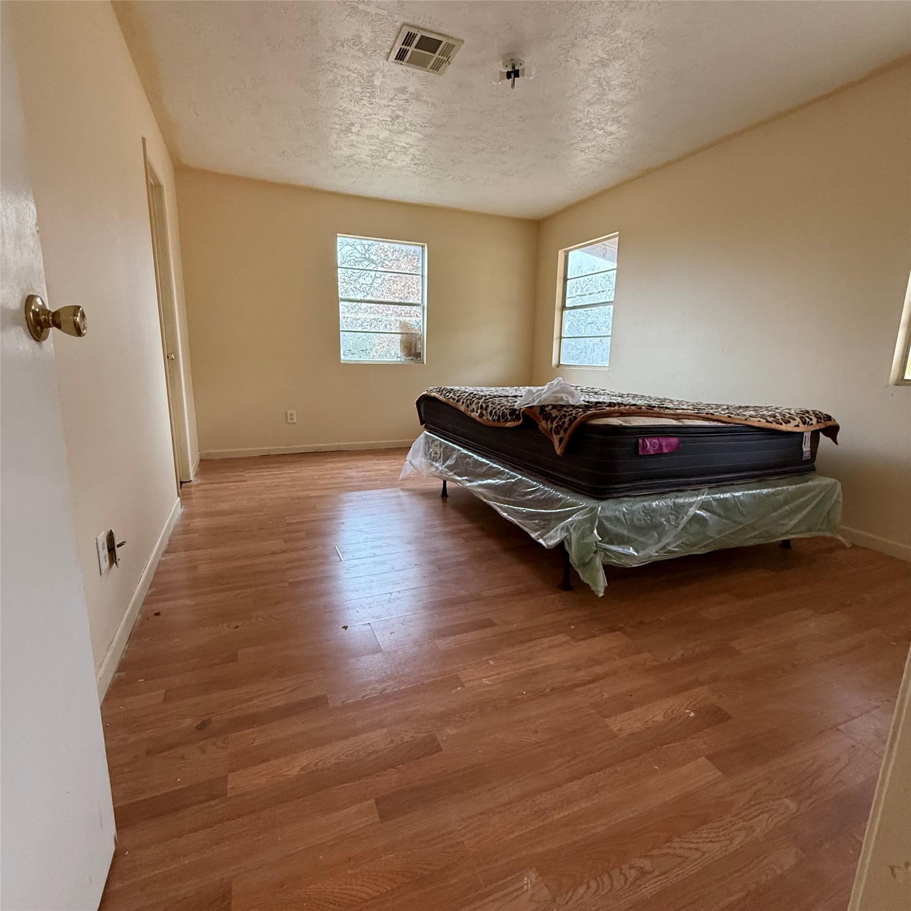 26113 Tyler Park Road Bedias, TX 77831 - Photo 7 of 24 a bedroom with a bed and window