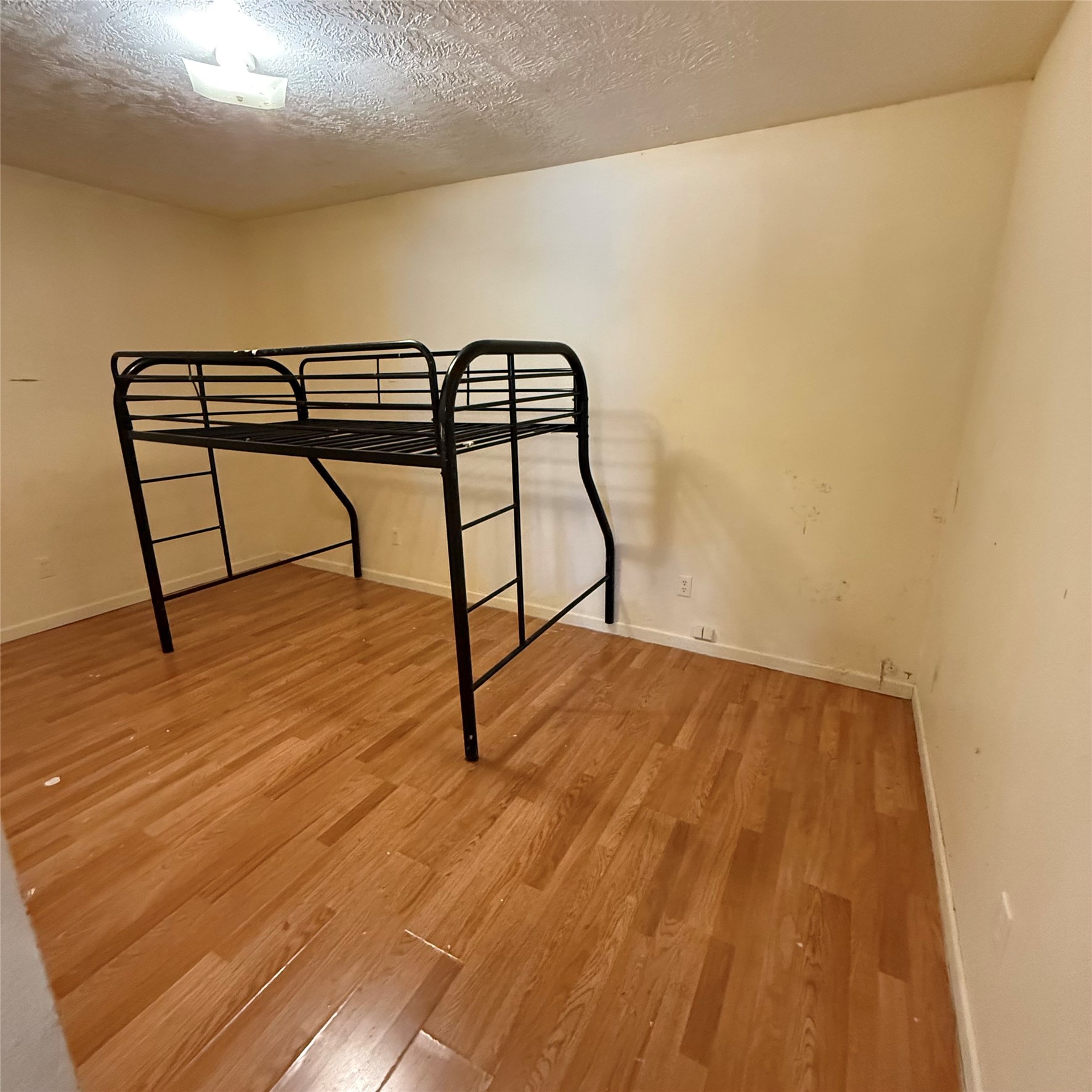 26113 Tyler Park Road Bedias, TX 77831 - Photo 10 of 24 a view of a room with wooden floor