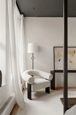 a bathroom with a bathtub and a sink