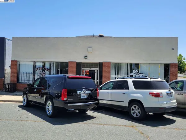 a view of a cars park in front of house