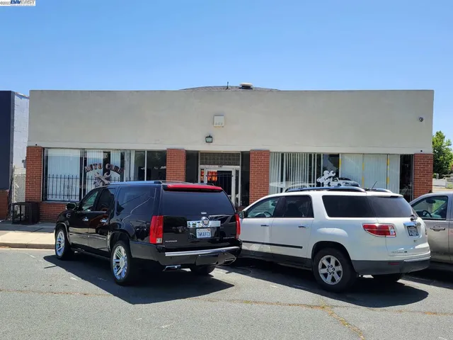 a view of a cars park in front of house