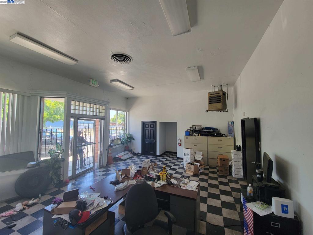 Undisclosed Address Pittsburg, CA 94565 - Photo 4 of 8 a living room with furniture and a flat screen tv