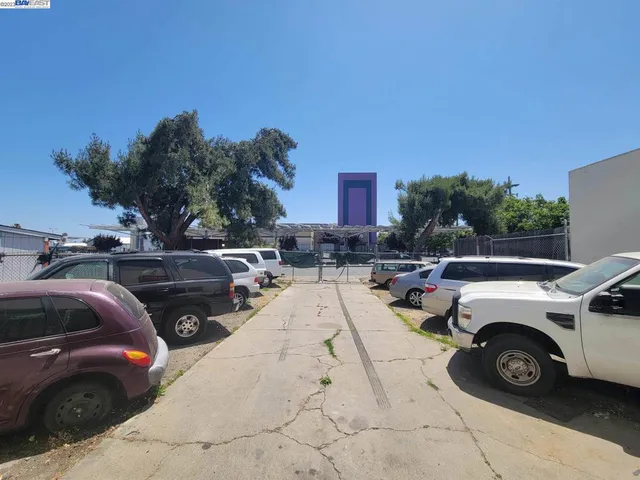 a view of a cars park in front of house