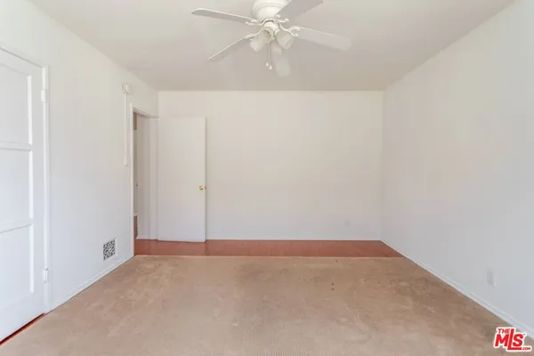 an empty room with an entryway
