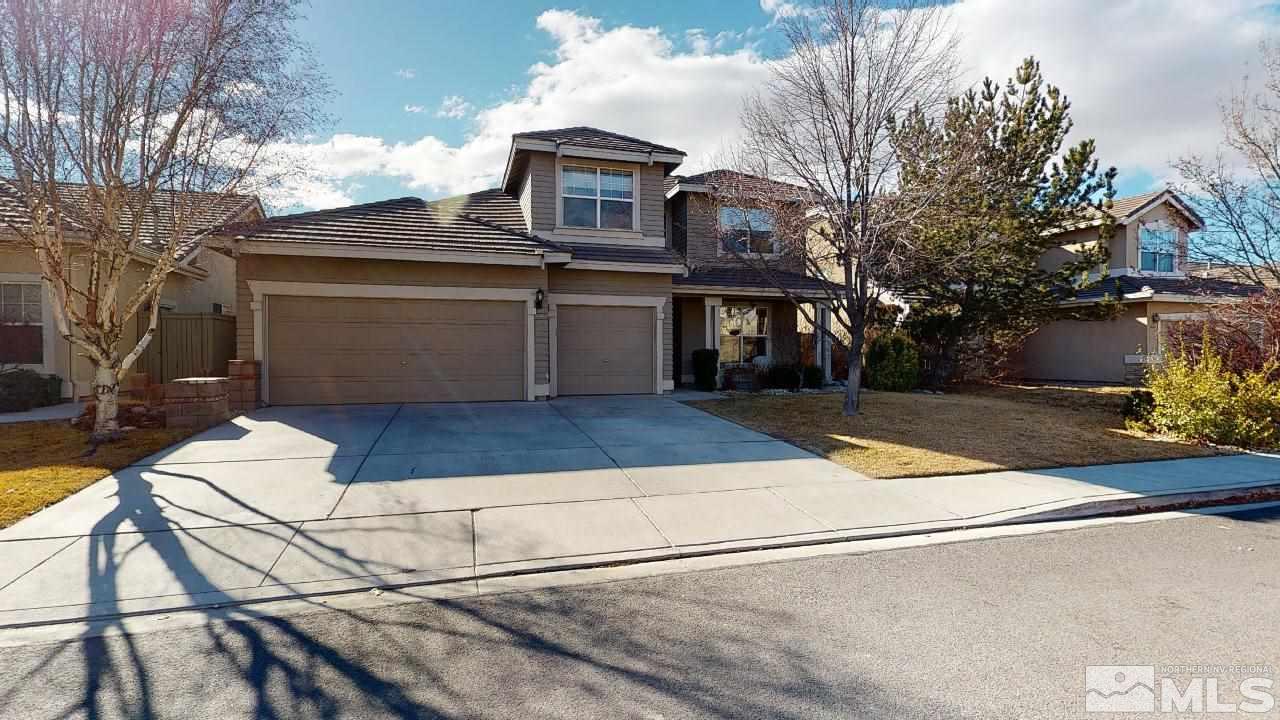 a front view of a house with yard