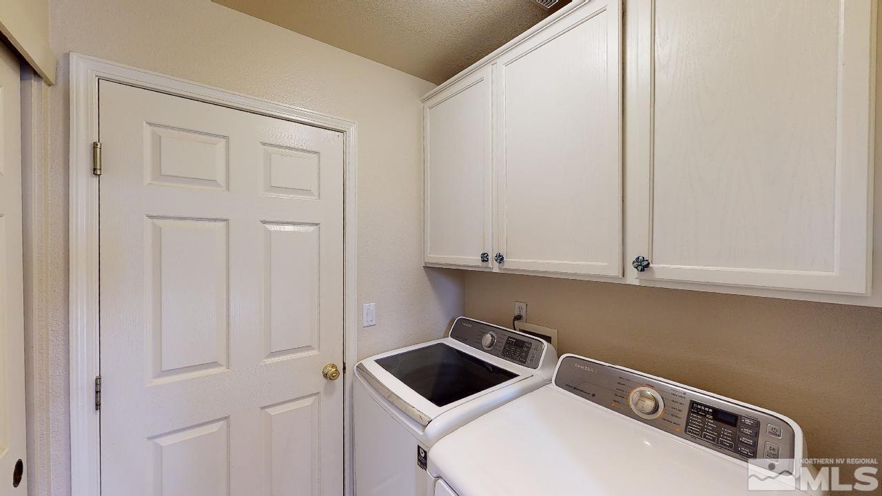 9565 Apache Rose Drive Reno, NV 89521 - Photo 15 of 25 a room with storage and utility
