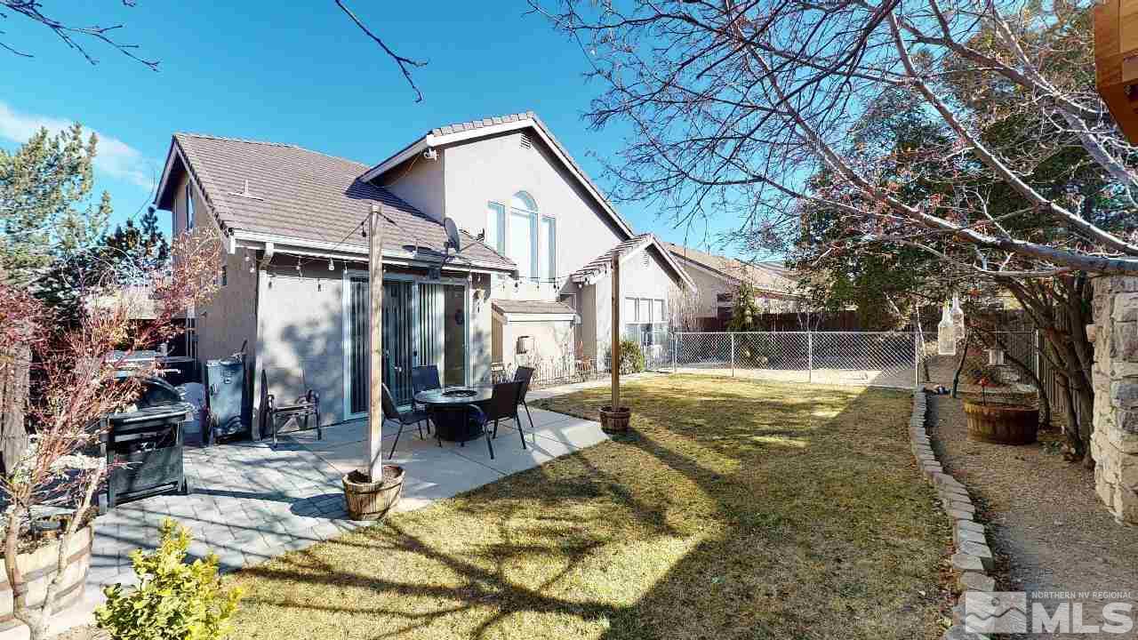 9565 Apache Rose Drive Reno, NV 89521 - Photo 24 of 25 a view of a house with backyard