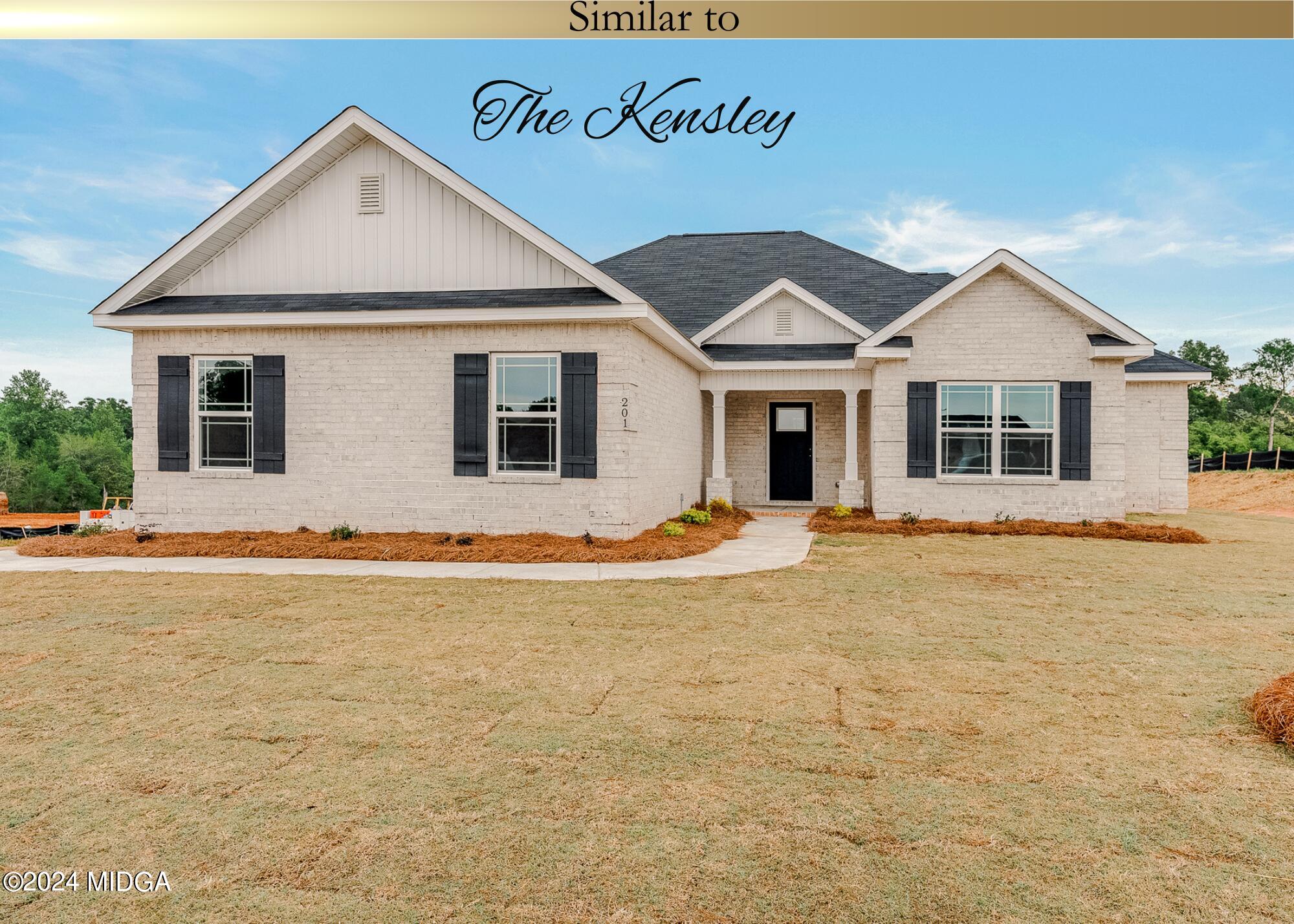 a front view of a house with yard