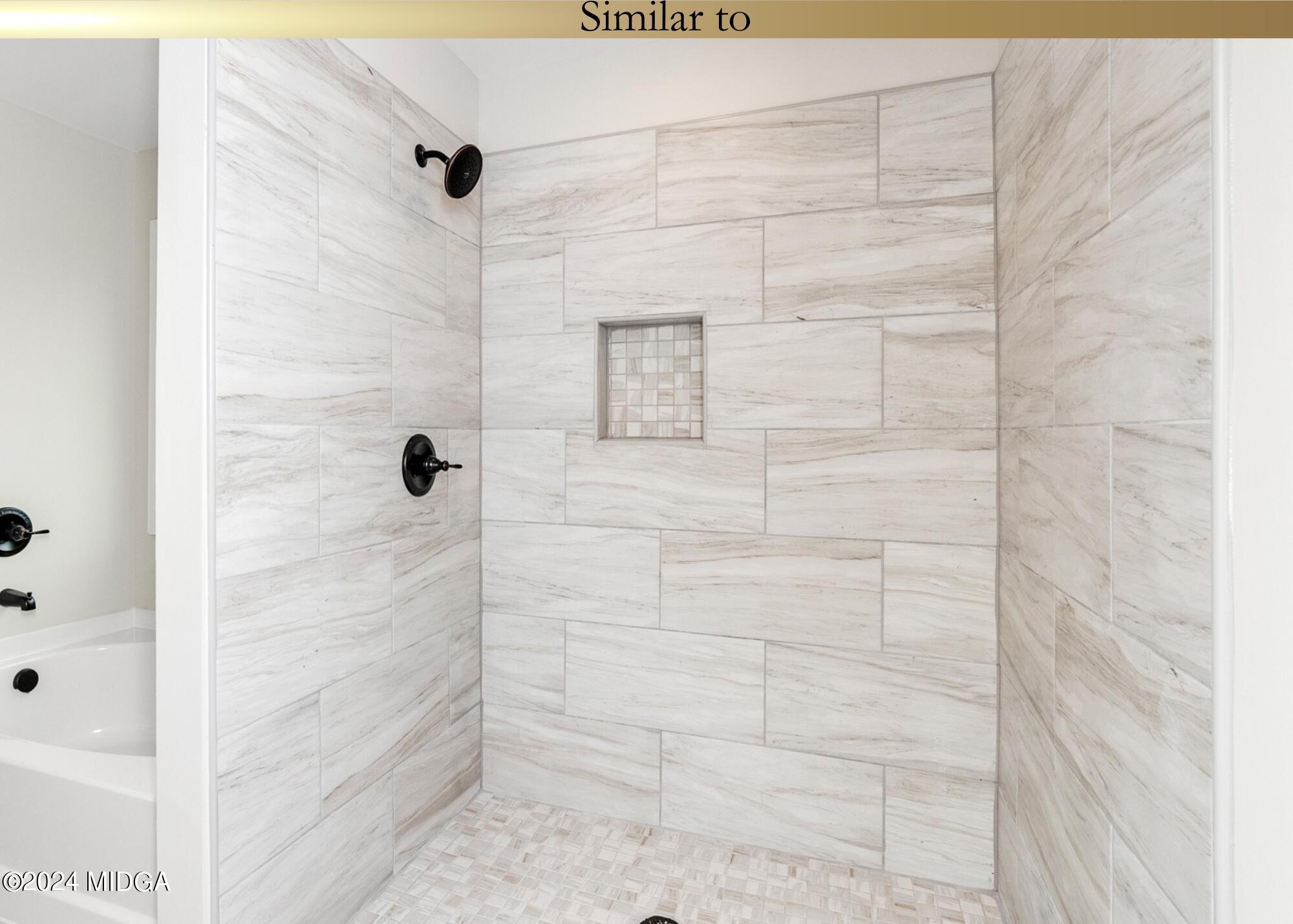 222 Overton Drive Perry, GA 31069 - Photo 14 of 18 a bathroom with a shower