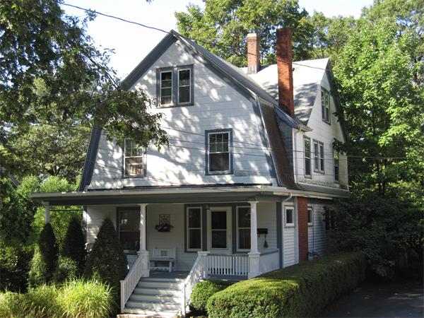 26 Nowell Road Melrose, MA 02176 - Photo 1 of 1 a front view of a house with garden