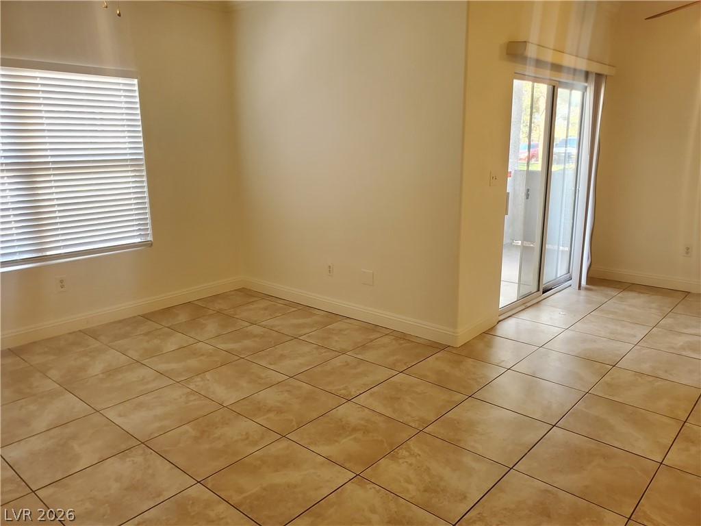 7255 West Sunset Road, Unit 1167 Las Vegas, NV 89113 - Photo 15 of 15 Empty room featuring light tile patterned floors and baseboards
