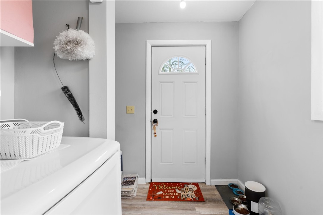68 Garrow Street Auburn, NY 13021 - Photo 17 of 41 Laundry area with view of backdoor
