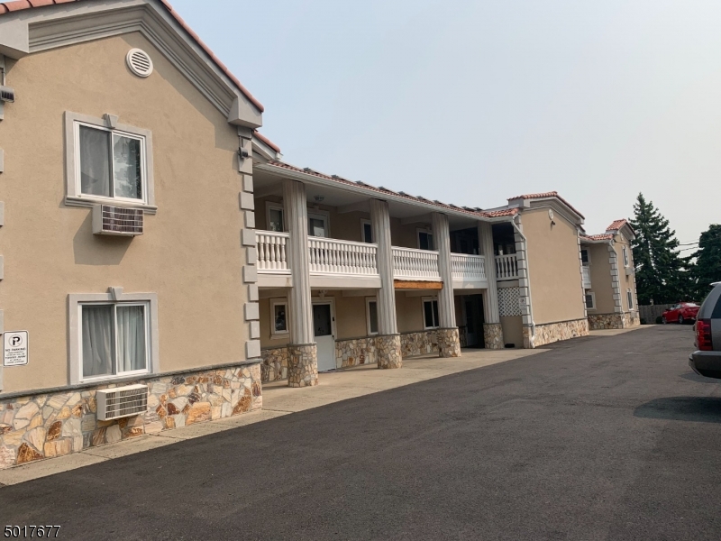 95 Park Street, Unit 3 Montclair, NJ 07042 - Photo 1 of 10 a front view of a house with a yard