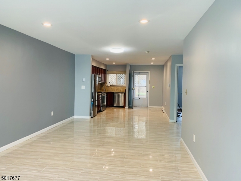 95 Park Street, Unit 3 Montclair, NJ 07042 - Photo 4 of 10 a view of empty room with wooden floor