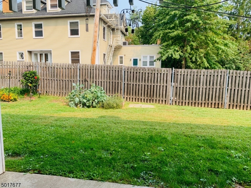 95 Park Street, Unit 3 Montclair, NJ 07042 - Photo 10 of 10 a front view of a house with a garden