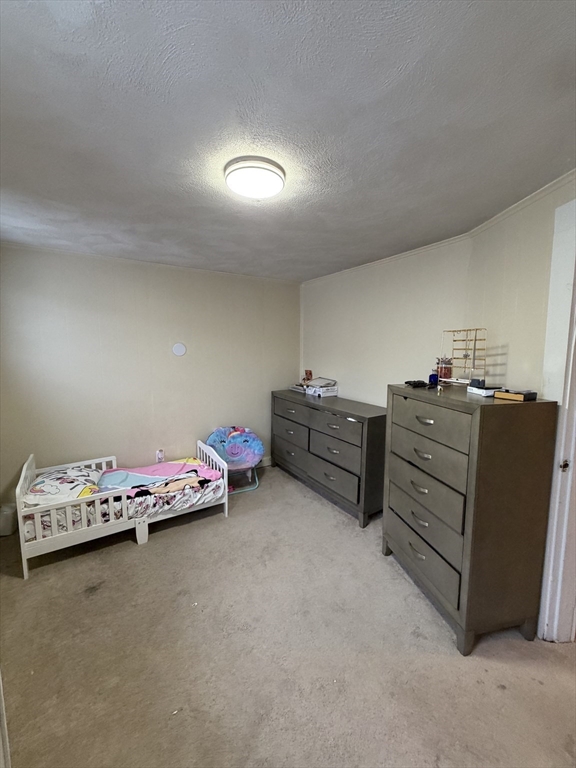 16 Linden Street Lynn, MA 01905 - Photo 17 of 23 a very nice looking room with a bed