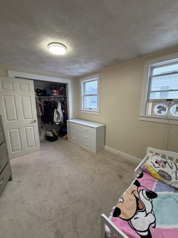 16 Linden Street Lynn, MA 01905 - Photo 18 of 23 a view of livingroom with furniture and closet