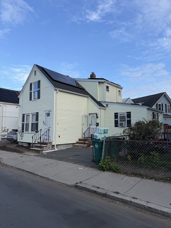16 Linden Street Lynn, MA 01905 - Photo 2 of 23 a view of a house with a street