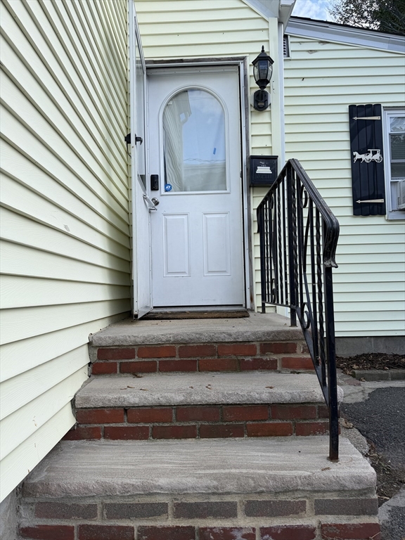 16 Linden Street Lynn, MA 01905 - Photo 4 of 23 a view of entrance gate of a house