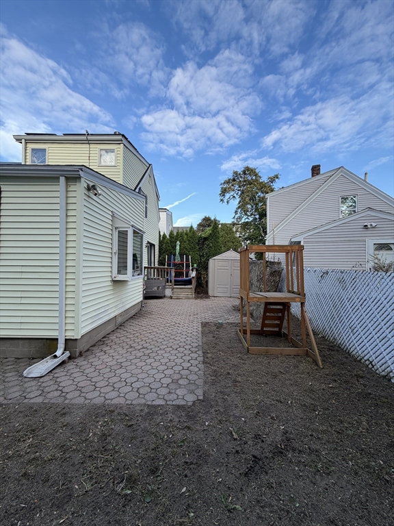 16 Linden Street Lynn, MA 01905 - Photo 5 of 23 a view of a backyard with sitting area