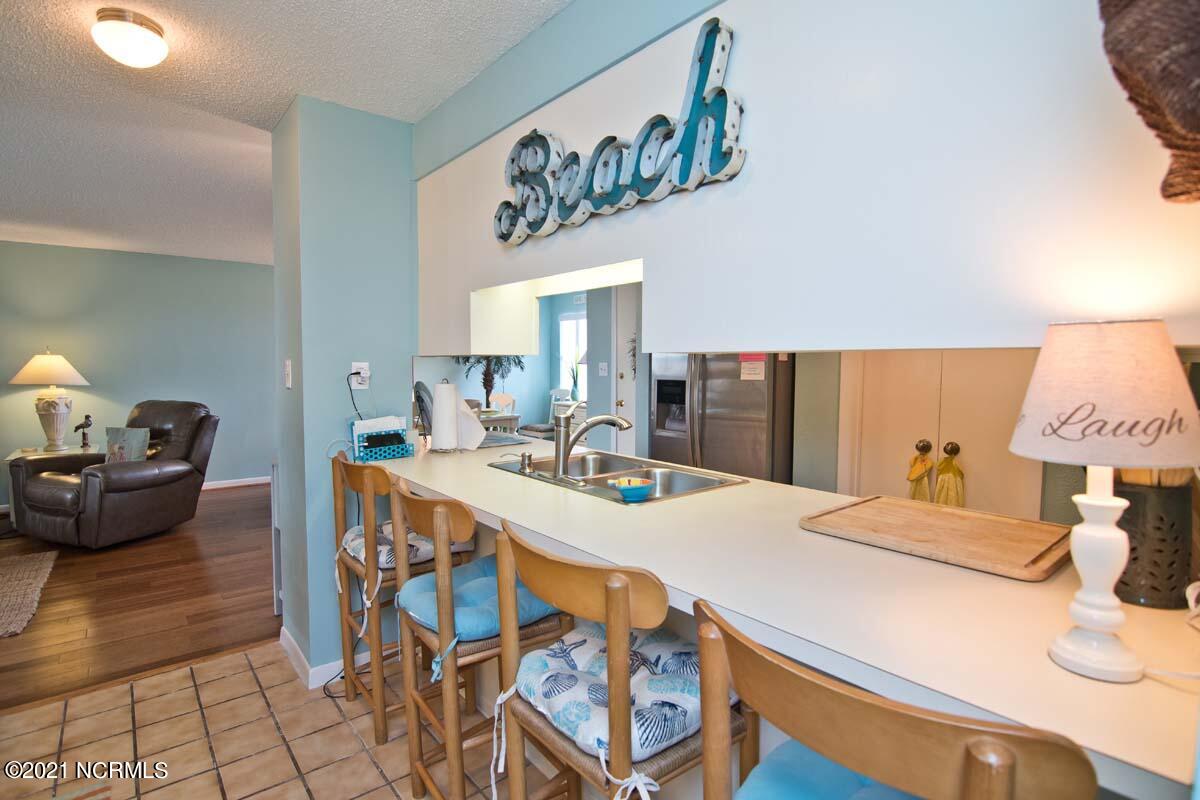 1505 Salter Path Road, Unit 439 Indian Beach, NC 28512 - Photo 11 of 44 Kitchen bar stools