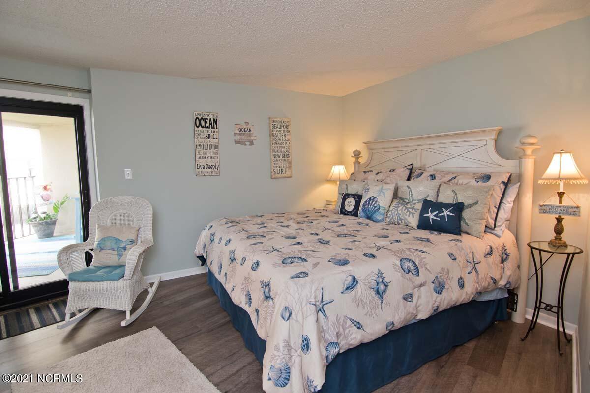 1505 Salter Path Road, Unit 439 Indian Beach, NC 28512 - Photo 16 of 44 Master Bedroom adj to private balcony