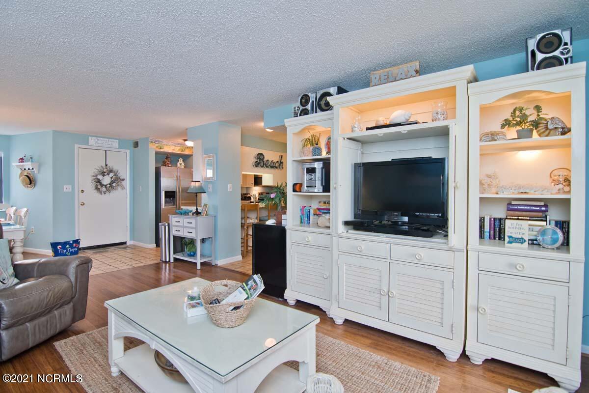 1505 Salter Path Road, Unit 439 Indian Beach, NC 28512 - Photo 6 of 44 Living Area Entertainment Center