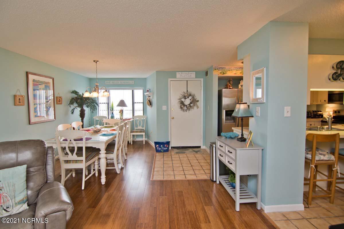 1505 Salter Path Road, Unit 439 Indian Beach, NC 28512 - Photo 7 of 44 Living area to dining & front door