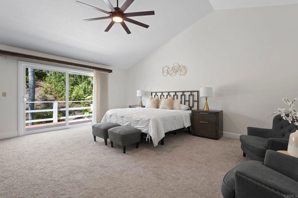 7056 Del Cerro Boulevard San Diego, CA 92120 - Photo 26 of 34 a bed sitting in a bedroom next to a window