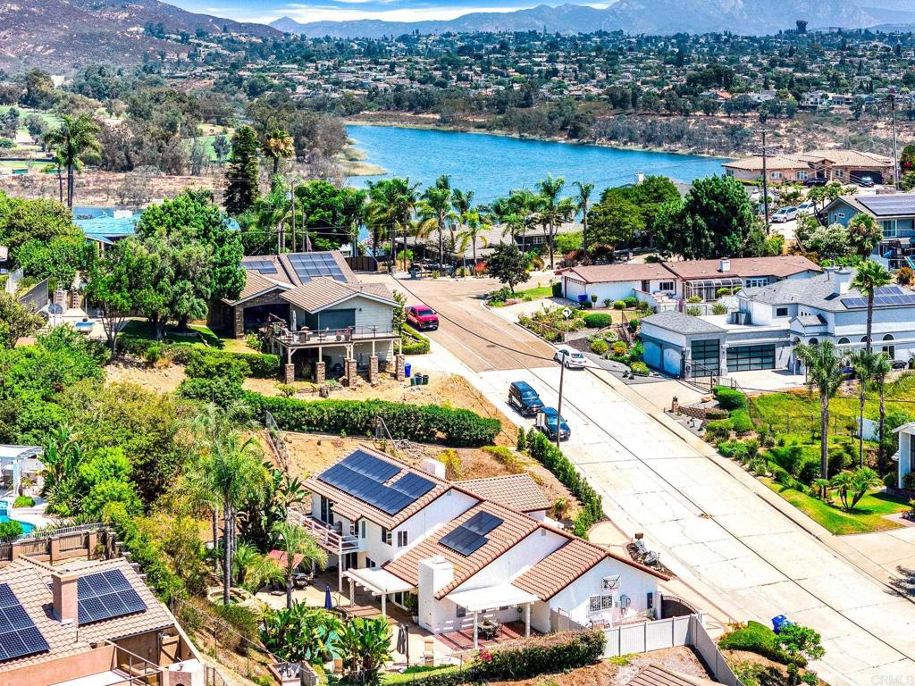 7056 Del Cerro Boulevard San Diego, CA 92120 - Photo 33 of 34 an aerial view of a house with a lake view
