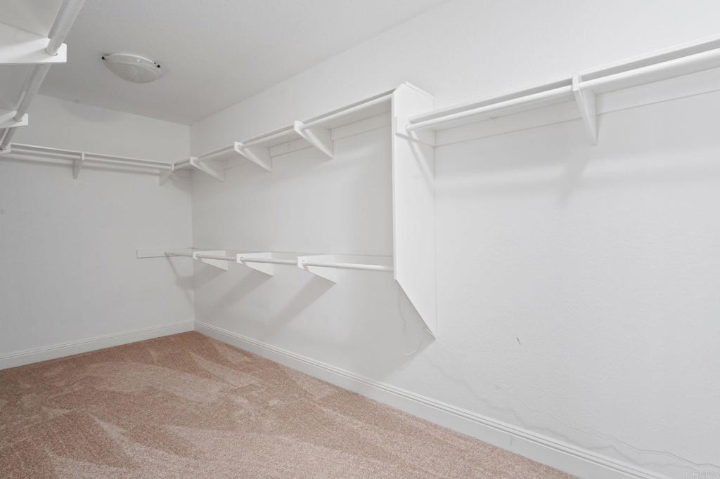 7056 Del Cerro Boulevard San Diego, CA 92120 - Photo 34 of 34 a view of an empty walk in closet