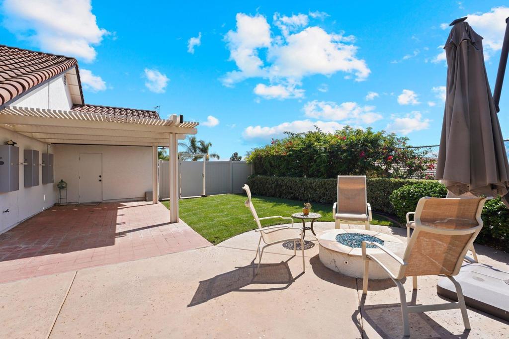 7056 Del Cerro Boulevard San Diego, CA 92120 - Photo 7 of 34 a view of backyard with patio