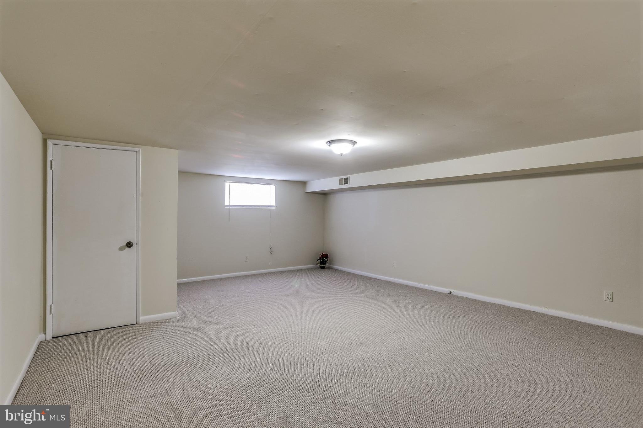 5648 Braxfield Road Halethorpe, MD 21227 - Photo 20 of 26 Large lower level Family ROom