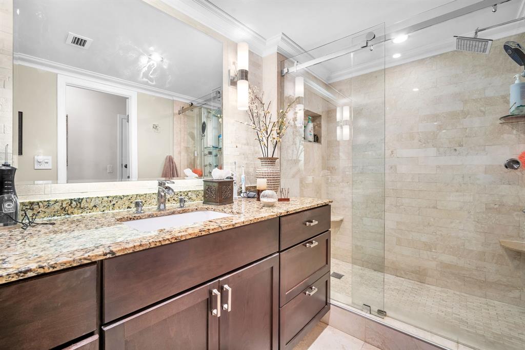 800 Northeast 195th Street, Unit 601 Miami, FL 33179 - Photo 20 of 35 a bathroom with a granite countertop sink mirror and double