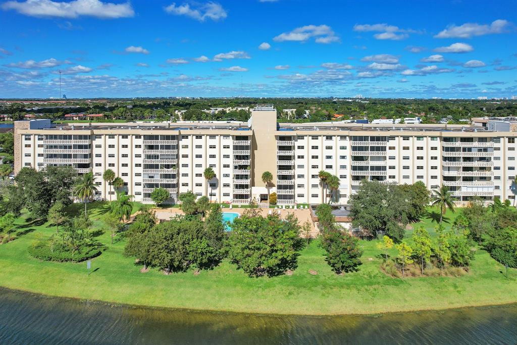 800 Northeast 195th Street, Unit 601 Miami, FL 33179 - Photo 35 of 35 a view of a lake from a yard