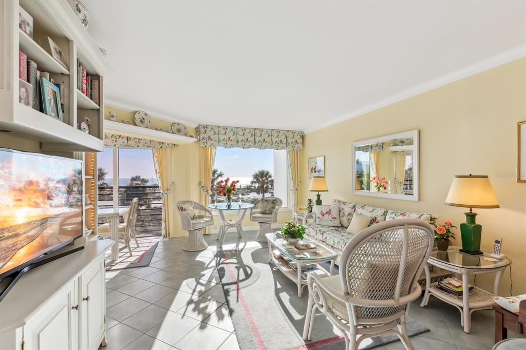 5000 Gasparilla Road, Unit BC203 Boca Grande, FL 33921 - Photo 5 of 34 a view of a living room and dining room