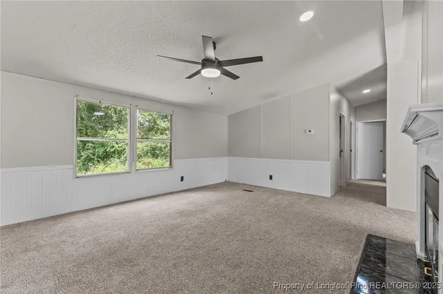 a view of livingroom with window and hardwood floor